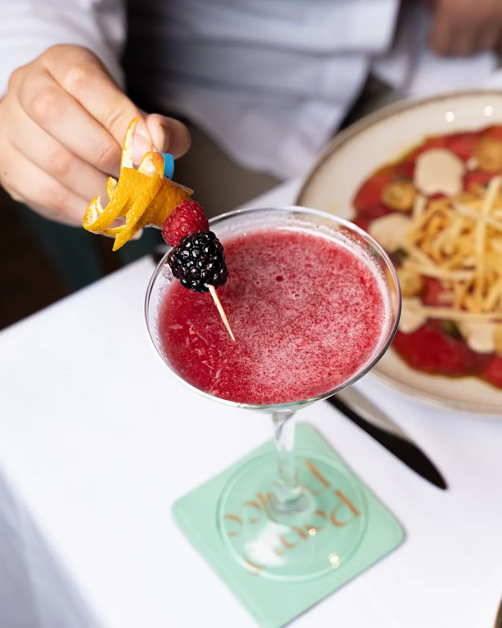 Red Margarita mocktail with red berries