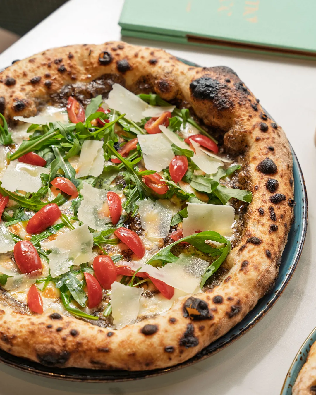 Preziosa pizza with truffle and cherry tomatoes